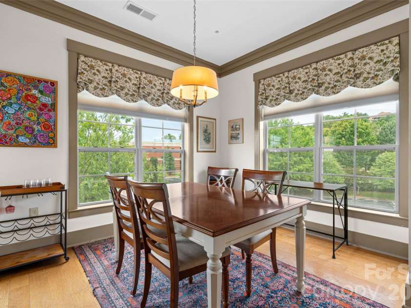 42 Schenck Parkway, Asheville, NC 28803.  MLS# CAR4413067, YatesRealty ID 1924. Dining Area Surrounded by Natural Light