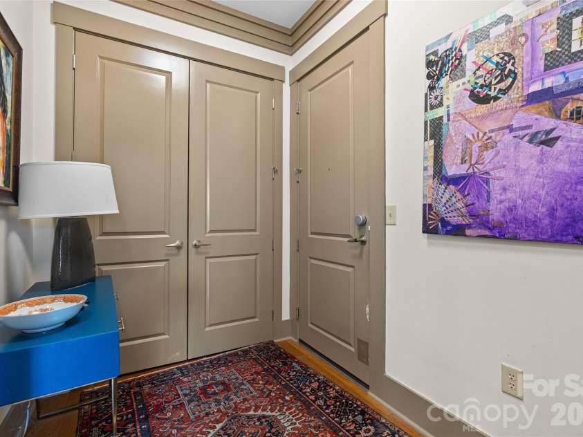 42 Schenck Parkway, Asheville, NC 28803.  MLS# CAR4413067, YatesRealty ID 1924. Entry with Spacious Coat Closet