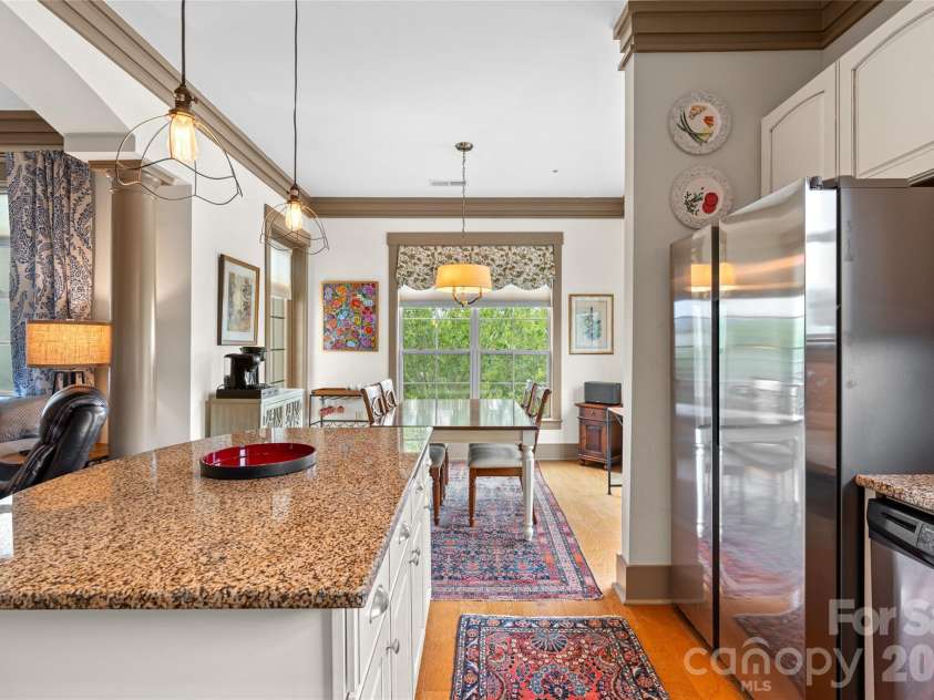 42 Schenck Parkway, Asheville, NC 28803.  MLS# CAR4413067, YatesRealty ID 1924. Kitchen Opens to Dining Area