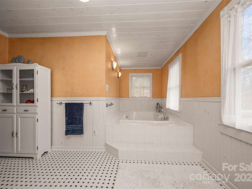 4888 Poors Ford Road, Rutherfordton, NC 28139.  MLS# CAR4246728, YatesRealty ID 19240. Expansive bathroom with oversized jetted soaking tub
