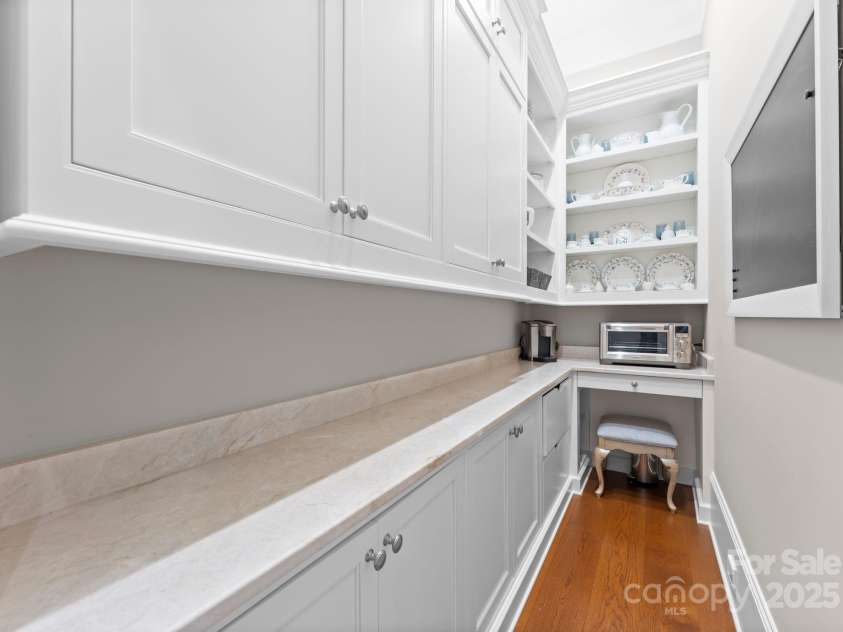 8228 Bay Pointe Drive, Denver, NC 28037.  MLS# CAR4238879, YatesRealty ID 19243. Scullery with quartzite counters, shelving & soft close cabinets!