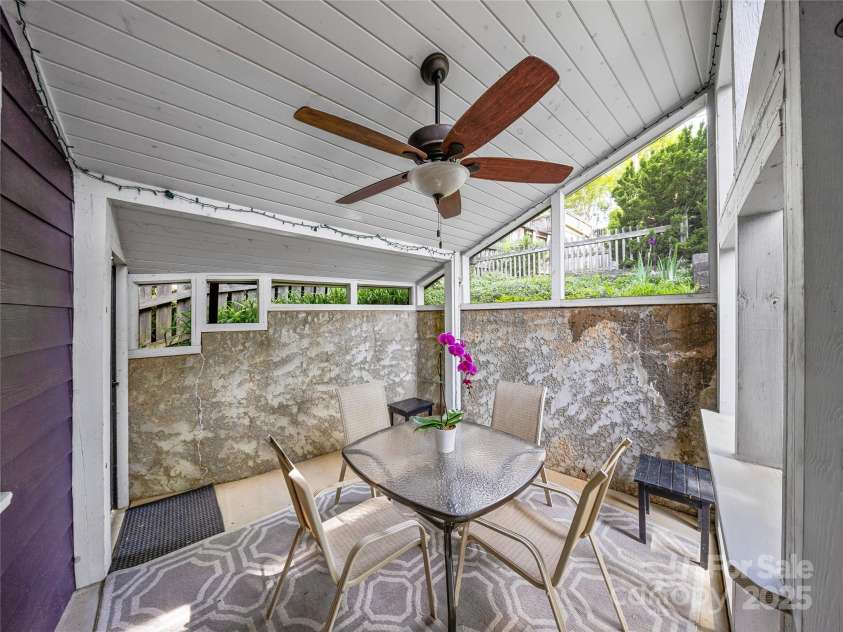 261 Murdock Avenue, Asheville, NC 28804.  MLS# CAR4260223, YatesRealty ID 19248. Screened-in porch for dinning and entertaining