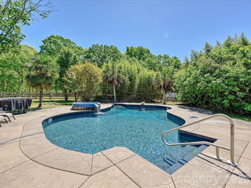 9850 Black Horse Run Road, Indian Land, SC 29707.  MLS# CAR4364062, YatesRealty ID 19249. Heated Pool