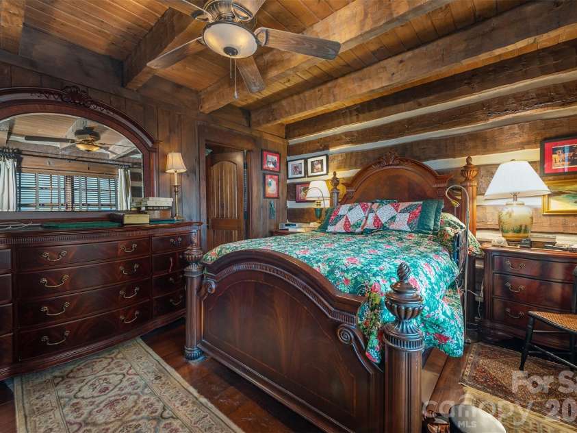 143 Daniel Boone Trail, Burnsville, NC 28714.  MLS# CAR4261449, YatesRealty ID 1925. Main level primary with fantastic mountain views