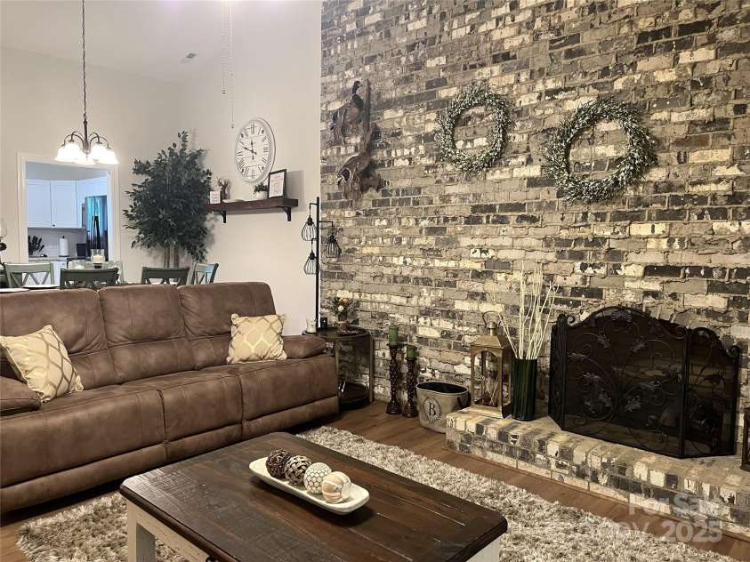 205 Wellington Hills Circle, Salisbury, NC 28147.  MLS# CAR4265156, YatesRealty ID 19253. Cozy Gas Fireplace