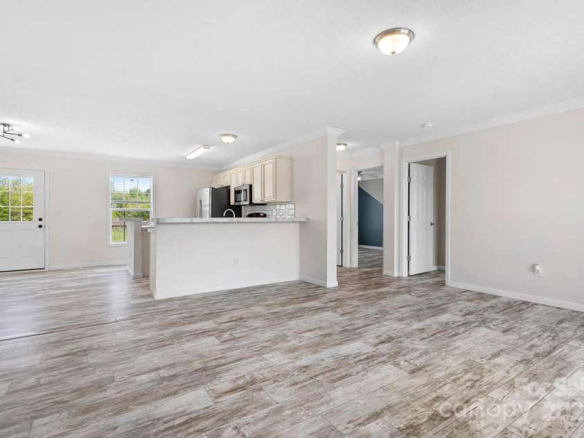 123 Pumice Drive, Statesville, NC 28625.  MLS# CAR4246160, YatesRealty ID 19254. Large open living area great for entertaining!