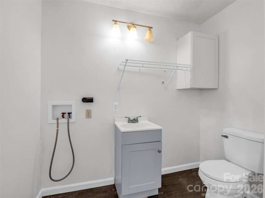1916 Old Spartanburg Road, Hendersonville, NC 28792.  MLS# CAR4378885, YatesRealty ID 19254. Laundry/Half Bathroom