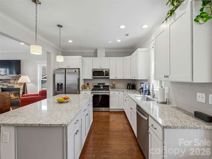 205 Weybridge Drive, Arden, NC 28704.  MLS# CAR4366273, YatesRealty ID 19255. Full kitchen angle with a gas stove