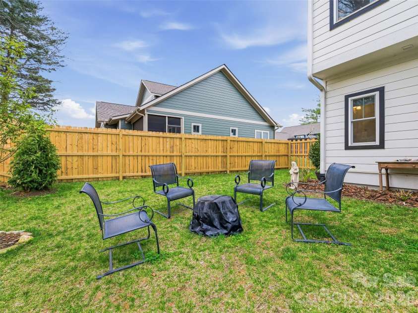 205 Weybridge Drive, Arden, NC 28704.  MLS# CAR4366273, YatesRealty ID 19255. Spacious Seating areas in the bak yard