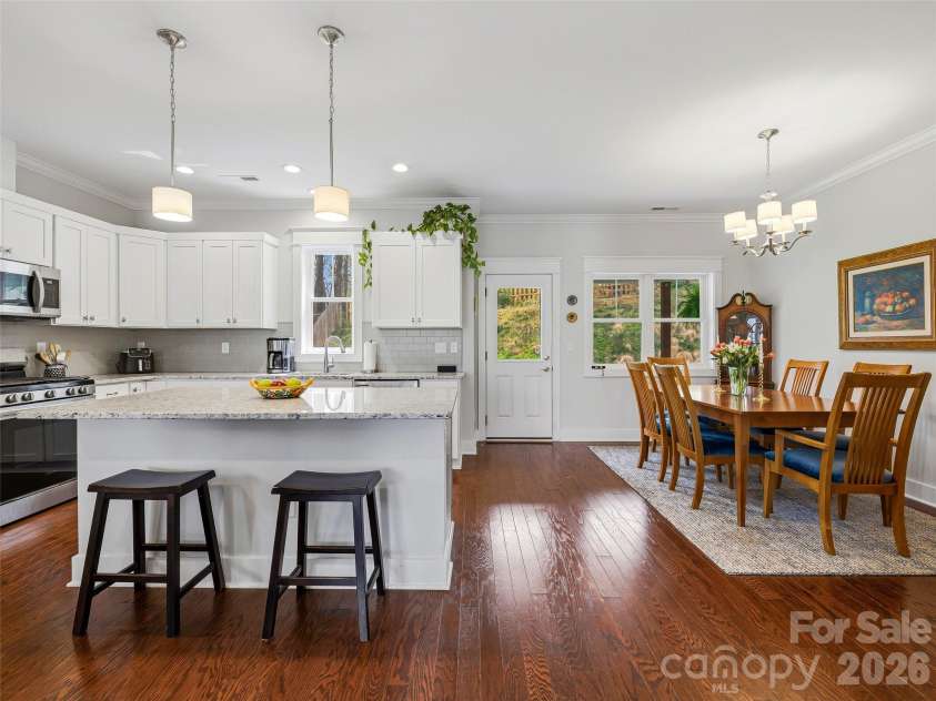 205 Weybridge Drive, Arden, NC 28704.  MLS# CAR4366273, YatesRealty ID 19255. View of the kitchen with the dining area