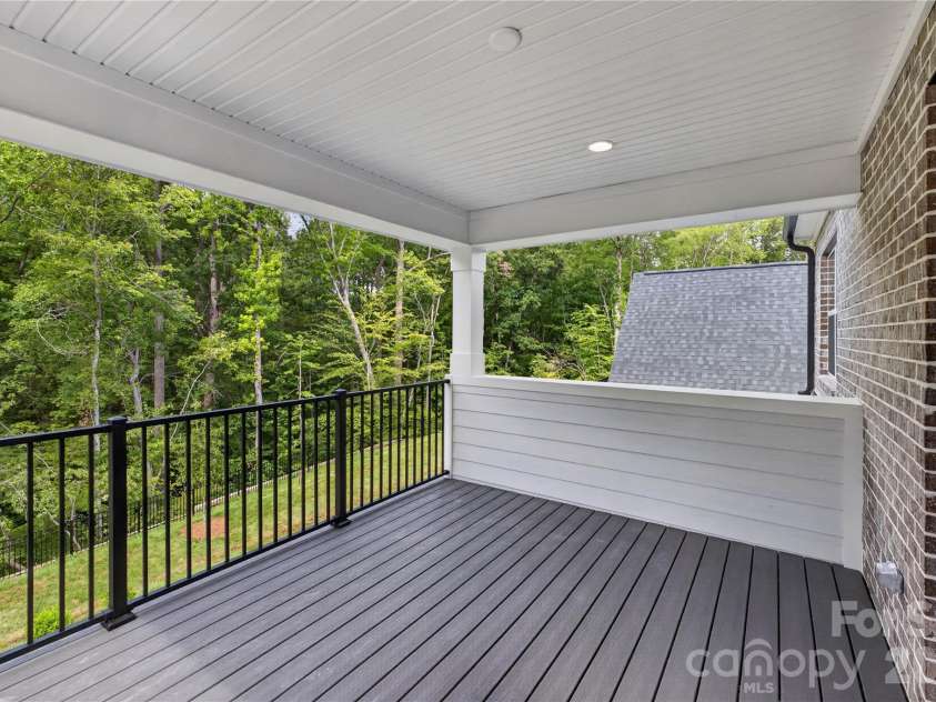 10934 Old Ravine Trail, Huntersville, NC 28078.  MLS# CAR4334775, YatesRealty ID 19256. Covered Deck