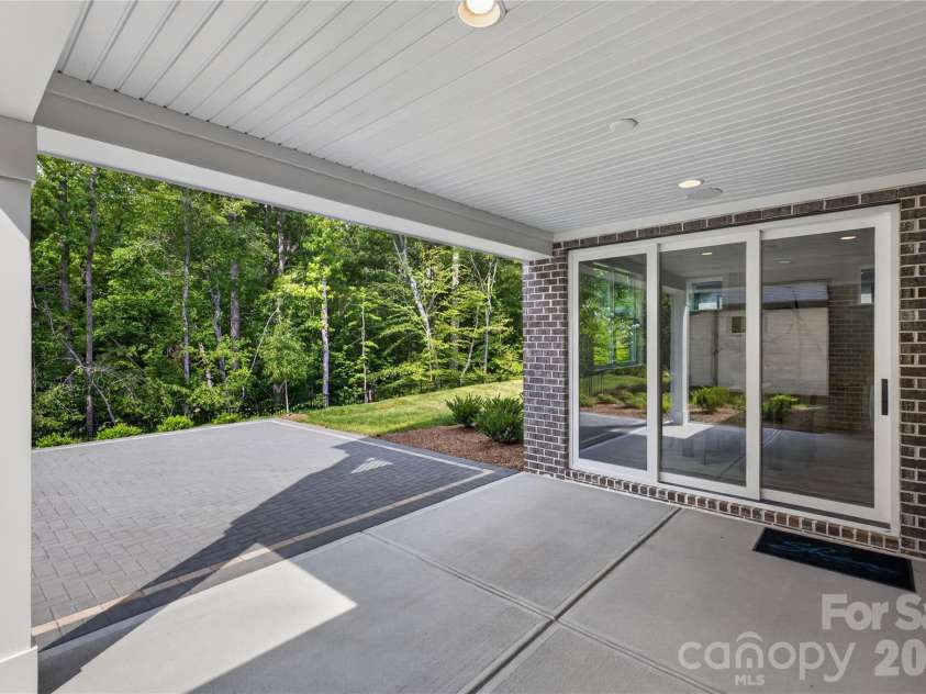 10934 Old Ravine Trail, Huntersville, NC 28078.  MLS# CAR4334775, YatesRealty ID 19256. Covered Patio