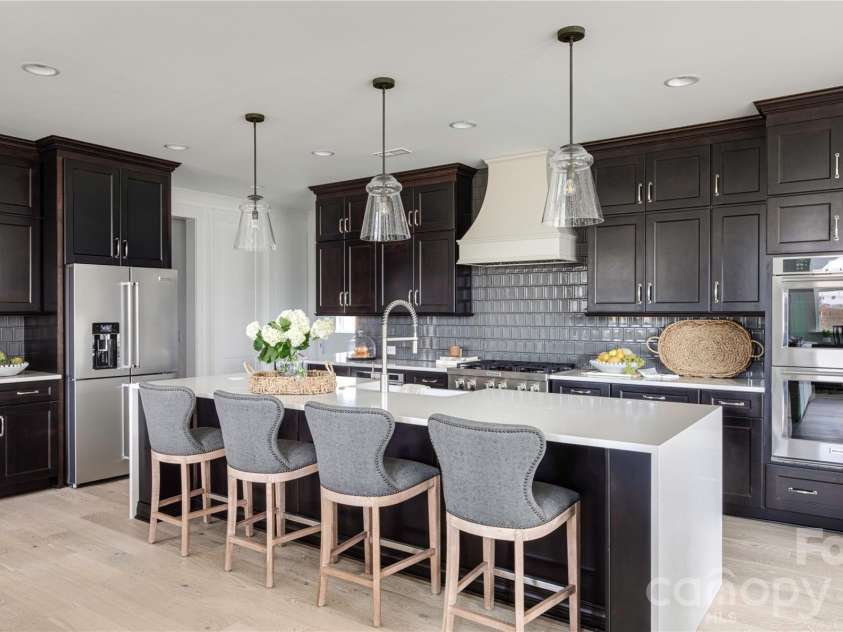 10938 Old Ravine Trail, Huntersville, NC 28078.  MLS# CAR4334825, YatesRealty ID 19257. Kitchen - Model Home Photo Example Only