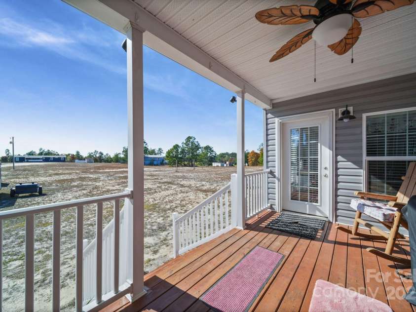 6179 Steen Road, Jefferson, SC 29718.  MLS# CAR4319586, YatesRealty ID 19265. Covered Back Porch