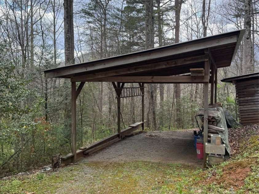 315 River Road, Sylva, NC 28779.  MLS# CAR4365027, YatesRealty ID 19267. Car or canoe storage area.