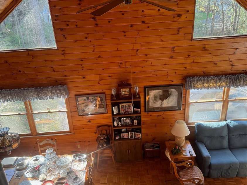 315 River Road, Sylva, NC 28779.  MLS# CAR4365027, YatesRealty ID 19267. Great room flooded with spring morning light!
