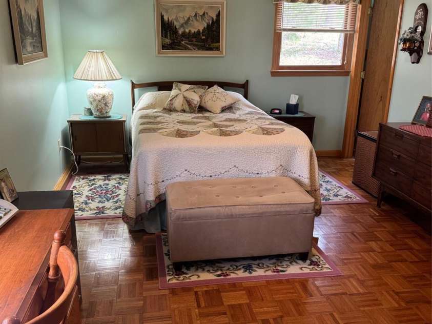 315 River Road, Sylva, NC 28779.  MLS# CAR4365027, YatesRealty ID 19267. Spacious master bedroom