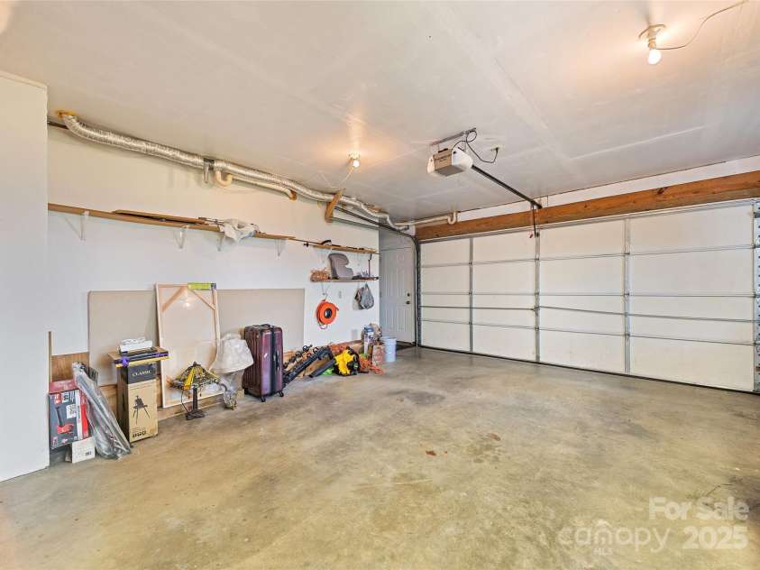 724 Pless Underwood Road, Maggie Valley, NC 28751.  MLS# CAR4268865, YatesRealty ID 19270. Garage; with automatic door opener