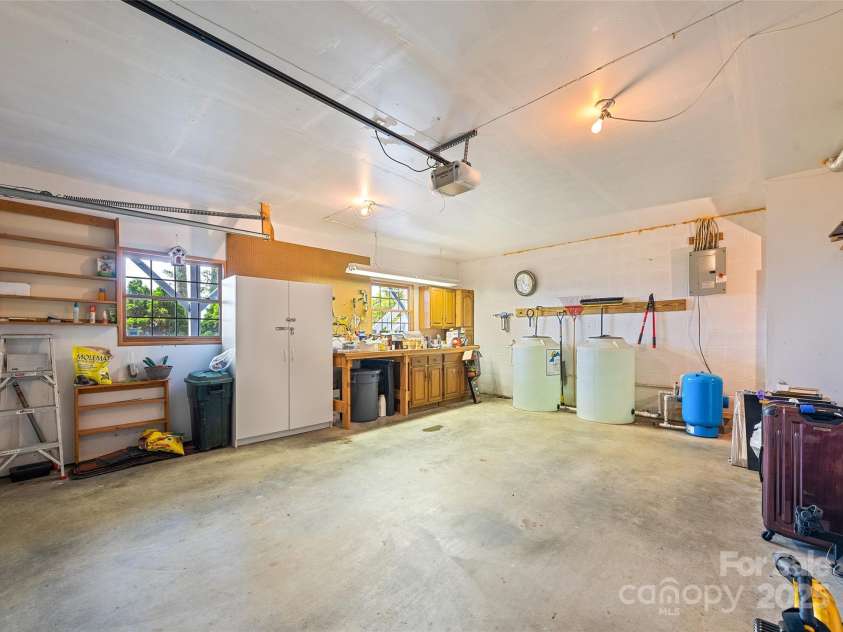 724 Pless Underwood Road, Maggie Valley, NC 28751.  MLS# CAR4268865, YatesRealty ID 19270. Garage; with workshop area