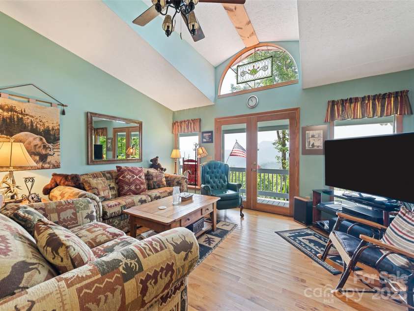 724 Pless Underwood Road, Maggie Valley, NC 28751.  MLS# CAR4268865, YatesRealty ID 19270. Living room; another angle