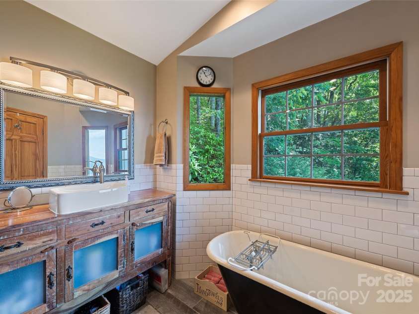 724 Pless Underwood Road, Maggie Valley, NC 28751.  MLS# CAR4268865, YatesRealty ID 19270. Primary bathroom