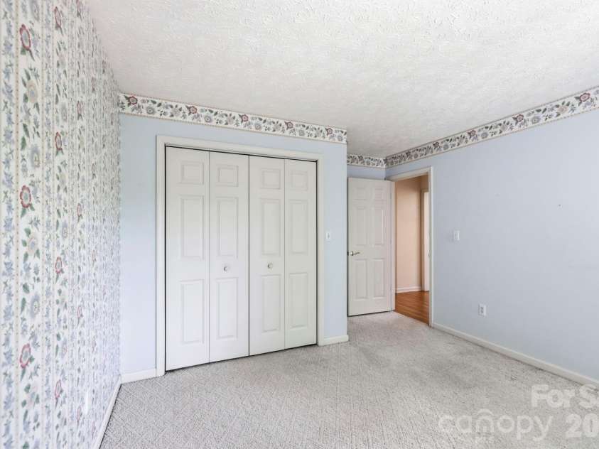 310 Windy Knoll Drive, Hendersonville, NC 28739.  MLS# CAR4374376, YatesRealty ID 19275. 