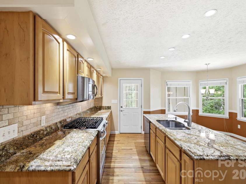 310 Windy Knoll Drive, Hendersonville, NC 28739.  MLS# CAR4374376, YatesRealty ID 19275. 