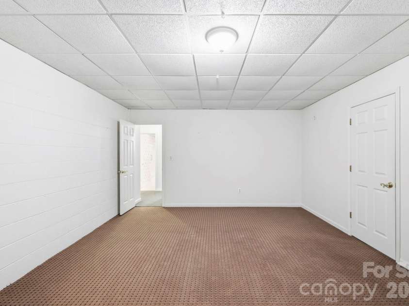 310 Windy Knoll Drive, Hendersonville, NC 28739.  MLS# CAR4374376, YatesRealty ID 19275. 