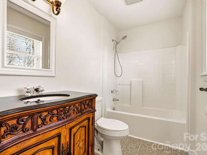 1212 3rd Street Drive, Conover, NC 28613.  MLS# CAR4357523, YatesRealty ID 19276. Full Guest Bathroom/Entry from Den