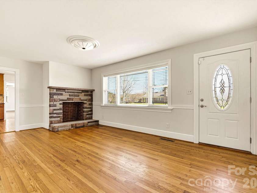 1212 3rd Street Drive, Conover, NC 28613.  MLS# CAR4357523, YatesRealty ID 19276. Living Room/Front Entry View