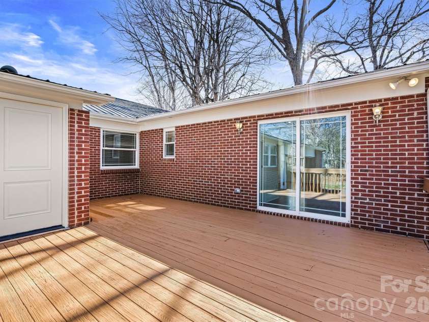 1212 3rd Street Drive, Conover, NC 28613.  MLS# CAR4357523, YatesRealty ID 19276. Spacious Back Deck/Laundry Room Entry View 