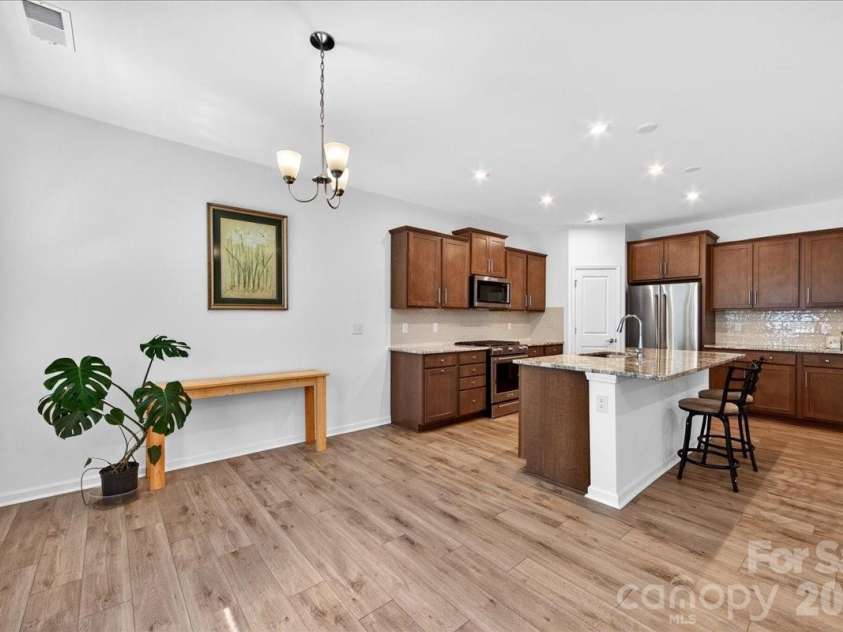 11119 Glasden Road, Charlotte, NC 28278.  MLS# CAR4395906, YatesRealty ID 19277. Dining and kitchen