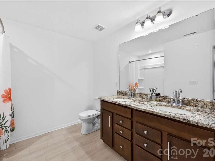 11119 Glasden Road, Charlotte, NC 28278.  MLS# CAR4395906, YatesRealty ID 19277. Full bath upstairs