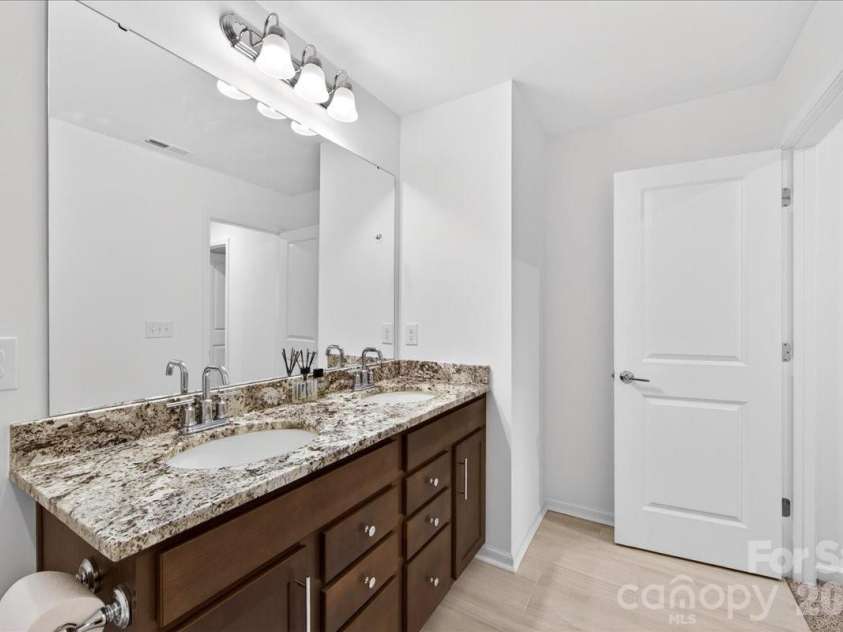 11119 Glasden Road, Charlotte, NC 28278.  MLS# CAR4395906, YatesRealty ID 19277. Full bath upstairs