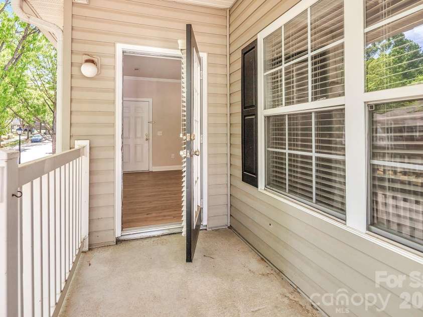 21232 Hickory Street, Cornelius, NC 28031.  MLS# CAR4372150, YatesRealty ID 19280. Front Porch/Balcony