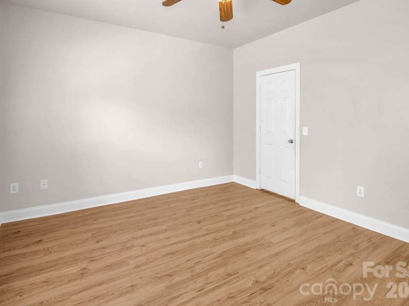 21232 Hickory Street, Cornelius, NC 28031.  MLS# CAR4372150, YatesRealty ID 19280. Primary Bedroom