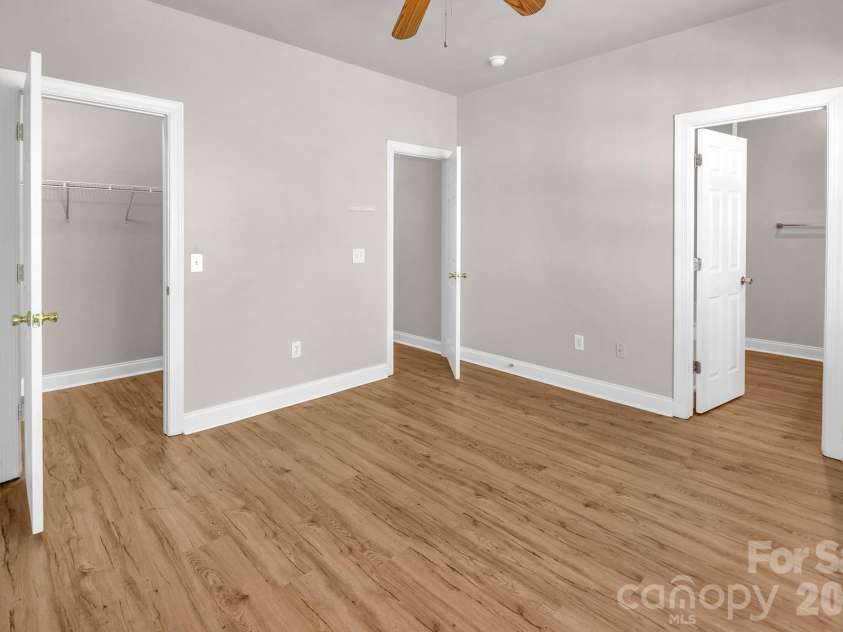 21232 Hickory Street, Cornelius, NC 28031.  MLS# CAR4372150, YatesRealty ID 19280. Primary Bedroom