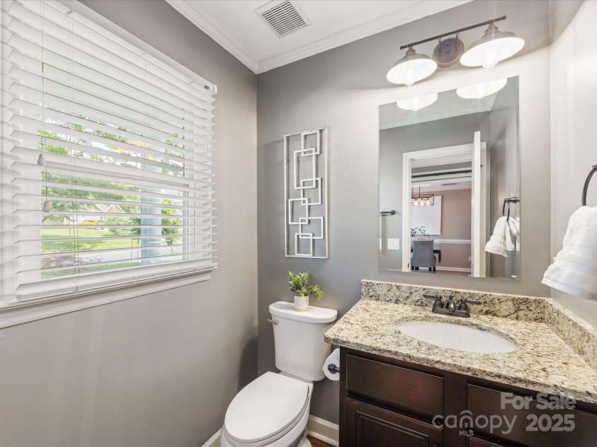 9908 Park Springs Court, Charlotte, NC 28210.  MLS# CAR4269654, YatesRealty ID 19287. Half bath downstairs