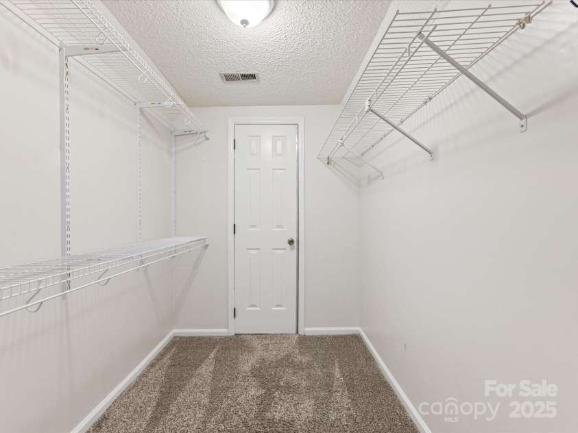 9908 Park Springs Court, Charlotte, NC 28210.  MLS# CAR4269654, YatesRealty ID 19287. Primary closet