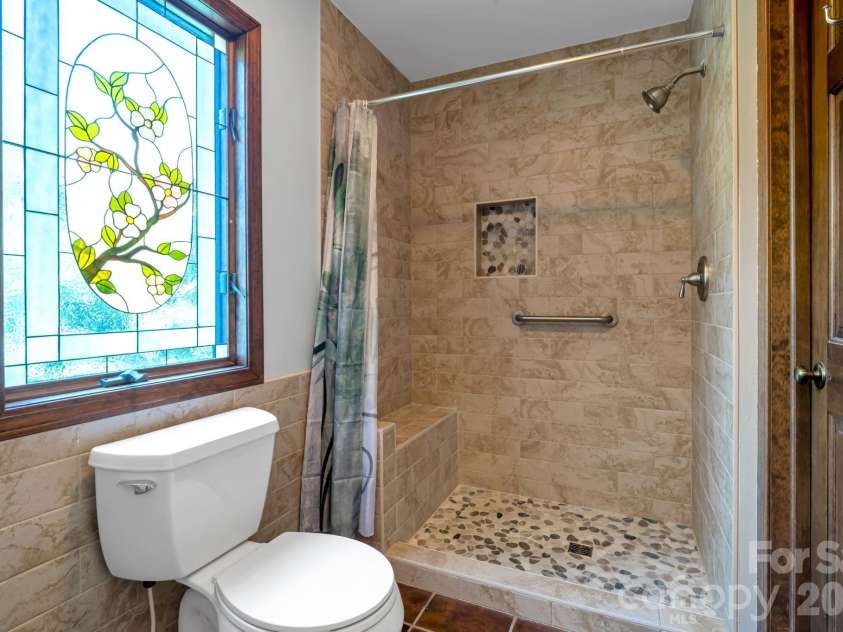 3104 Cove Loop Road, Hendersonville, NC 28739.  MLS# CAR4362842, YatesRealty ID 19289. Bathroom with practical layout and modern touches