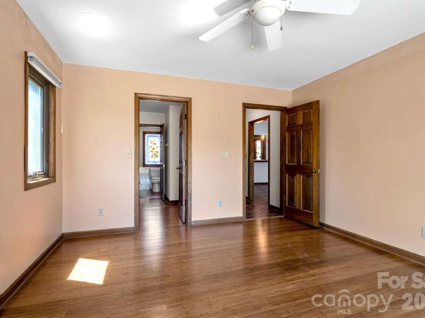 3104 Cove Loop Road, Hendersonville, NC 28739.  MLS# CAR4362842, YatesRealty ID 19289. Bedroom offering comfort and functionality