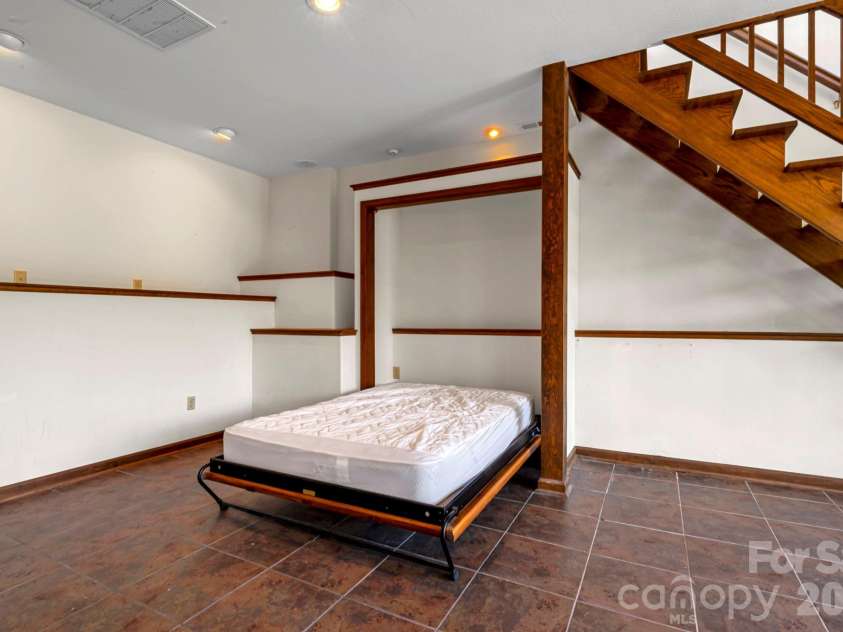 3104 Cove Loop Road, Hendersonville, NC 28739.  MLS# CAR4362842, YatesRealty ID 19289. Built-in Murphy bed offering smart, space-saving functionality