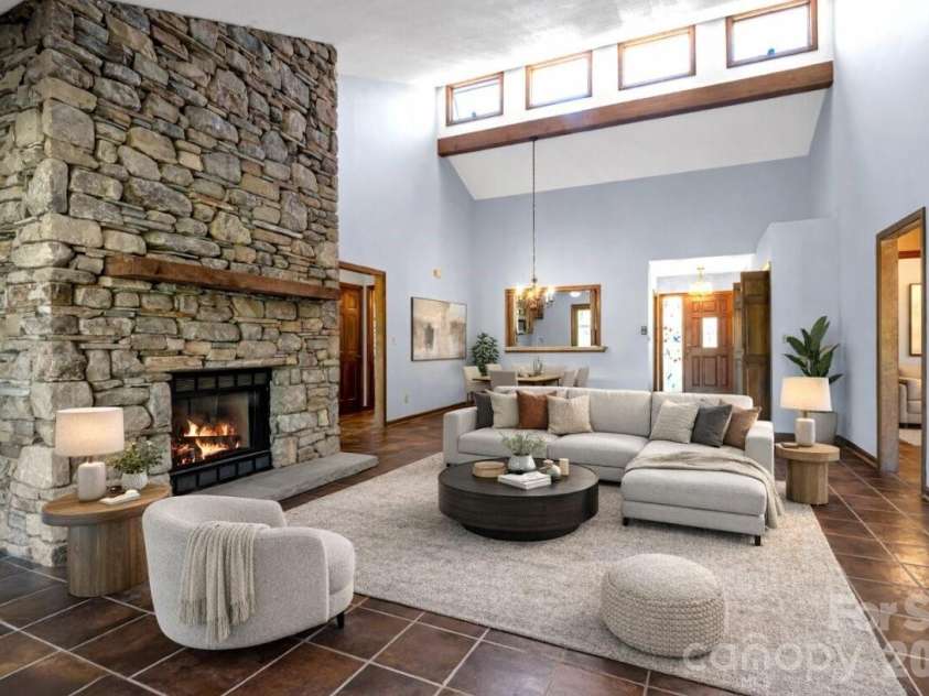 3104 Cove Loop Road, Hendersonville, NC 28739.  MLS# CAR4362842, YatesRealty ID 19289. Virtually Stagged Living Room