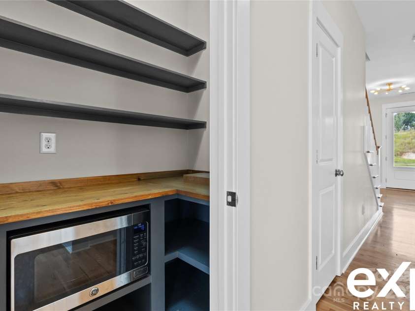 664 Bluff Loop Road, Rock Hill, SC 29730.  MLS# CAR4230849, YatesRealty ID 1929. Pantry with microwave and appliance shelf