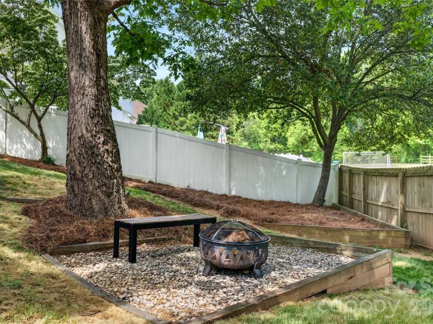 118 Easy Street, Mooresville, NC 28117.  MLS# CAR4367530, YatesRealty ID 19291. Firepit area