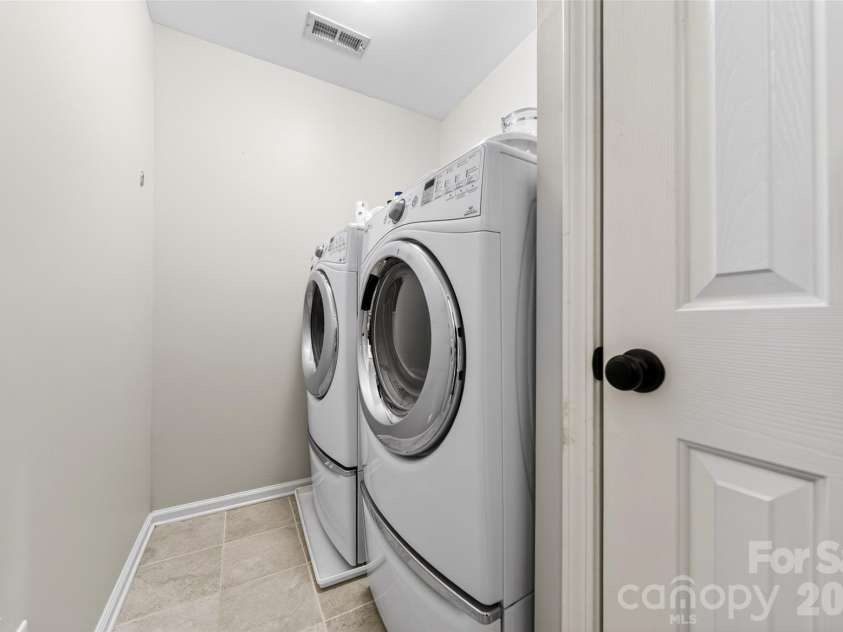 118 Easy Street, Mooresville, NC 28117.  MLS# CAR4367530, YatesRealty ID 19291. Laundry Room is upstairs