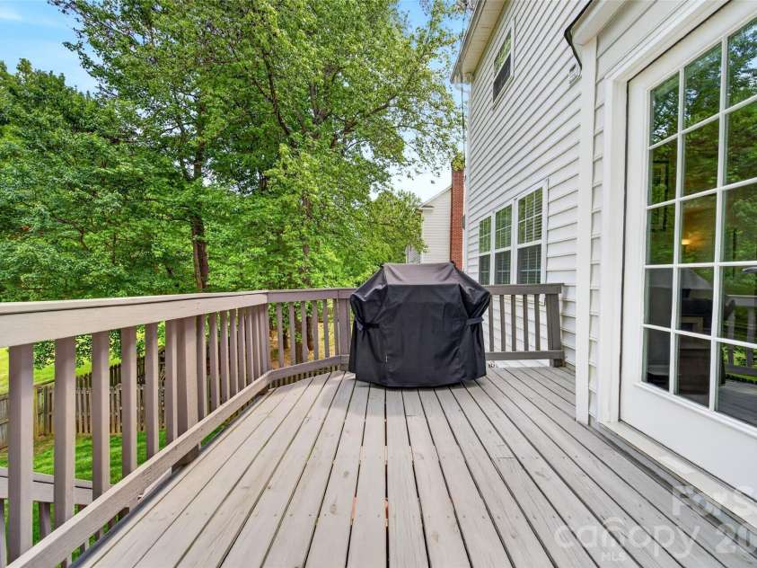 118 Easy Street, Mooresville, NC 28117.  MLS# CAR4367530, YatesRealty ID 19291. Space for Grilling and enjoying the peaceful views of the Greenway