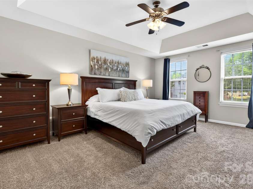 118 Easy Street, Mooresville, NC 28117.  MLS# CAR4367530, YatesRealty ID 19291. The Owners Suite upstairs has a tray ceiling and ceiling fan