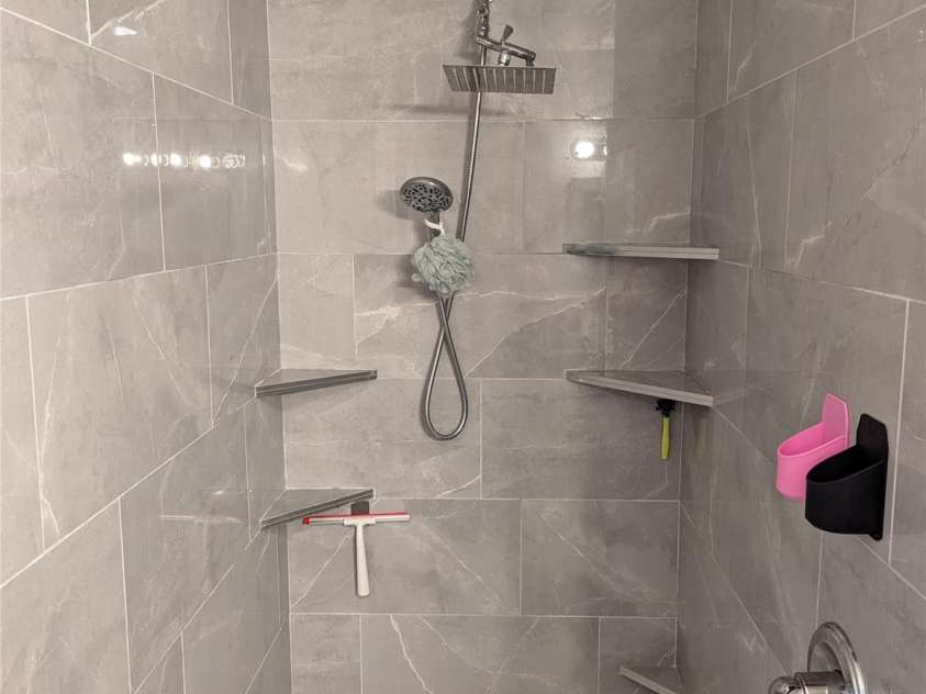 3106 Brevard Road, Hendersonville, NC 28791.  MLS# CAR4154139, YatesRealty ID 19297. Walk-in shower in full bath