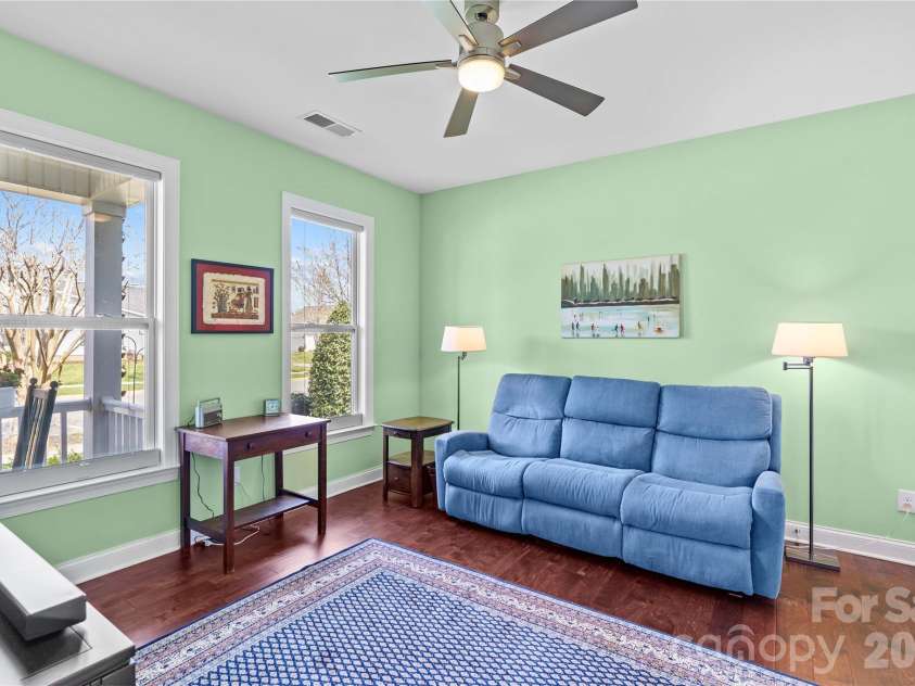 11528 Dublin Crescent Road, Cornelius, NC 28031.  MLS# CAR4364945, YatesRealty ID 19301. Bedroom #3 features wood floors and two large closets.